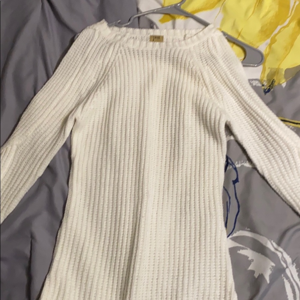 White sweater.